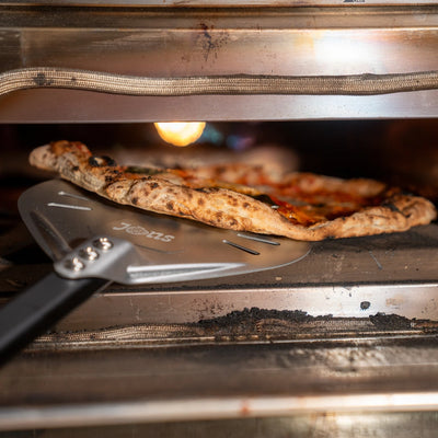 Privat pizza servering